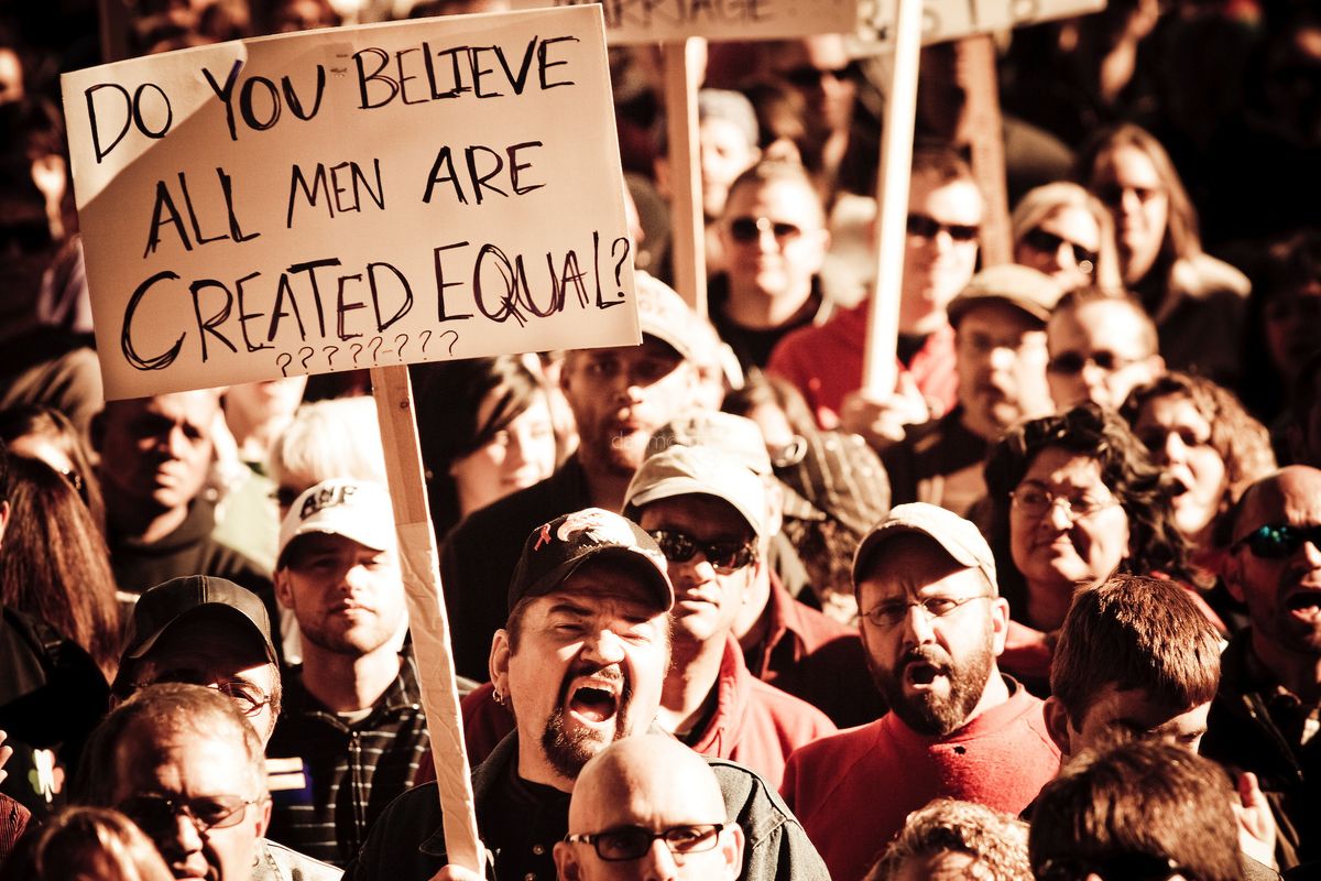 Photo By: Dan Morris Protester holds sign at a rally in Salt Lake City protesting the California Prop 8 Decision, Nov 15, 2008 (Dan Morris)